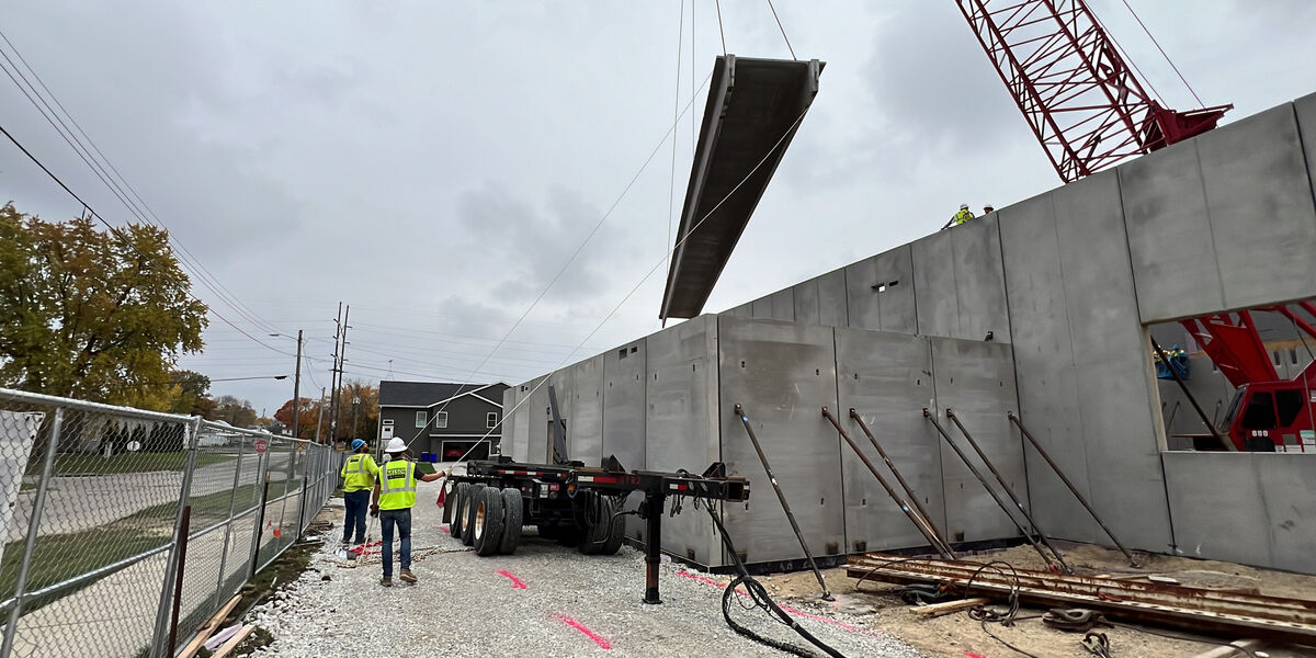 Double-T pre-cast roof panel crane pick for YMCA indoor aquatic center project in Iowa.