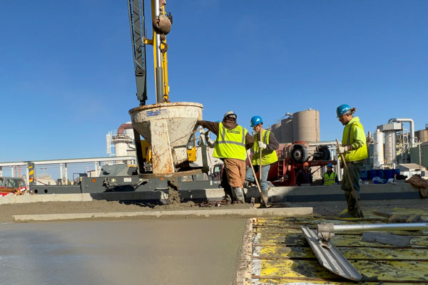 Floor slab pour at industrial site.