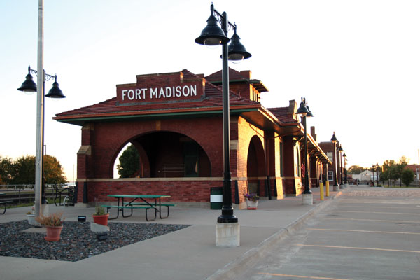 Historic brick train depot raised above the flood plain.