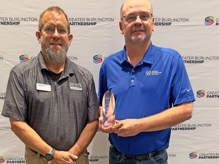 Carl A. Nelson & Company and Western Smokehouse Partners after presentation of the Greater Burlington Partnership 2025 Manufacturer of the Year Award.