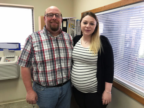 <b>Caitlin Bliesener, right, new human resource associate at Carl A. Nelson & Company, with her father, Director of Field Resources Jerry Bliesener, in his warehouse office in Burlington.</b> (CANCO photo)